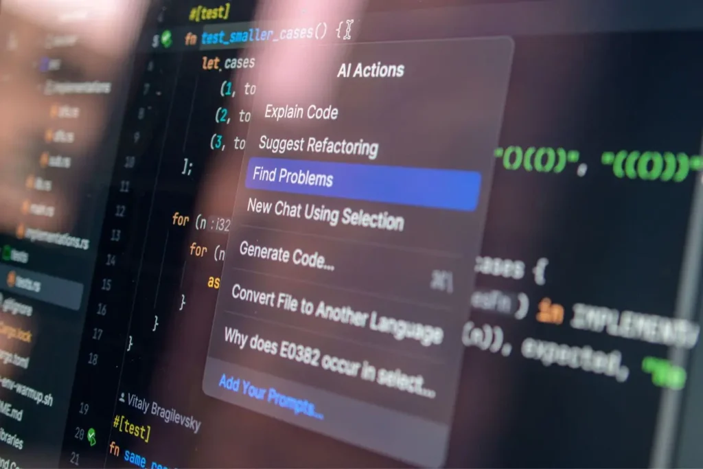Écran d’ordinateur affichant éditeur de code avec menu IA, image qui illustre l’usage de l’IA générative pour optimiser son business.